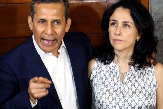 Peru's former President Ollanta Humala speaks next to his wife Nadine Heredia outside their home after being released from preventative detention awaiting trial on charges of money laundering, in Lima on April 30, 2018.