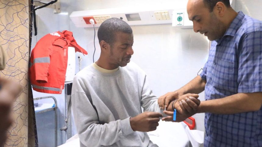 The Palestine Red Crescent Society released images of Assad al-Nsasrah being examined at Al-Amal Hospital in Khan Younis after his release.