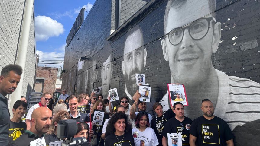 People gather to demand the release of US hostages detained abroad in Washington, DC, on April 30.