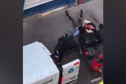 Four masked men attacked the daughter, her partner and their child on Tuesday morning.