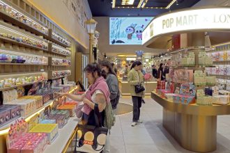 Customers purchase products at a Pop Mart store in London on May 21, 2025.