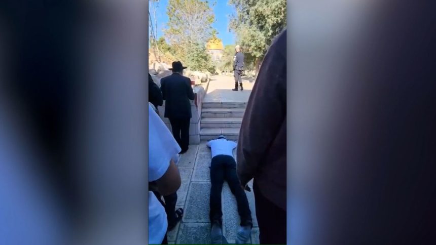 Far-right Israeli lawmaker Zvi Sukkot praying at the al-Aqsa compound in the Old City of Jerusalem on Thursday, April 17.