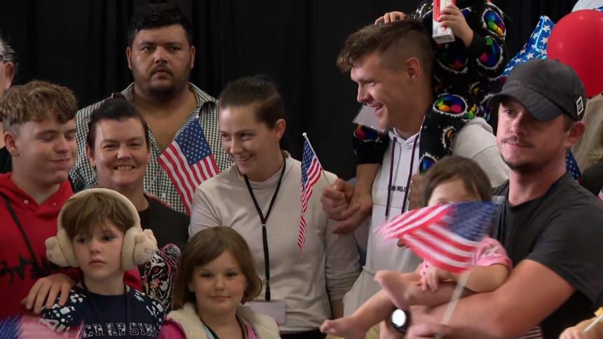 White South Africans granted refugee status in the United States by the Trump administration arrive at Washington Dulles airport in Virginia on Monday, May 12, 2025.