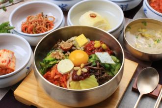 Bibimbap: This Korean lunch-in-a-bowl mixes together a simple salad of rice, mixed vegetables, rice, beef and egg, with sesame oil and a dollop of chili paste for seasoning.