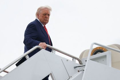 US President Donald Trump boards Air Force One as he departs for Pennsylvania at Joint Base Andrews, Maryland,  on Friday.