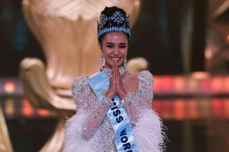 Thailand's Opal Suchata Chuangsri reacts after being crowned Miss World in Hyderabad, India, on Saturday.