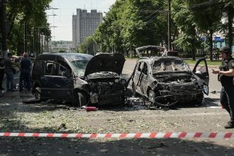 Police officers stand at the site of Russian missile strike, amid Russia's attack on Ukraine in Sumy, June 3, 2025. REUTERS/Stringer