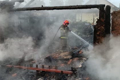 A firefighter attends a site of a drone attack in Pryluky, Ukraine, on Thursday.
