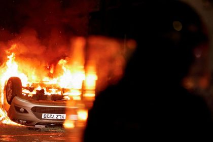 A vehicle burns during a second night of riots, in Ballymena, Northern Ireland, on June 11, 2025.