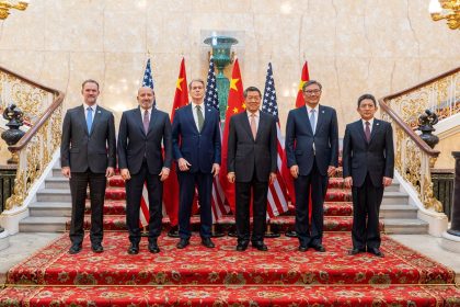 US and Chinese negotiators jointly pose for a photo during trade discussions at Lancaster House in London on June 9, 2025.