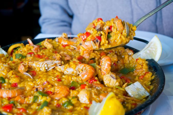 Paella: Originating in the region around Valencia, paella traditionally comes in two varieties: paella Valenciana (with rabbit and chicken) and seafood paella.