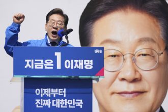 Lee Jae-myung, the liberal Democratic Party candidate projected to win Tuesday's election, speaks while campaigning in Seoul on May 12.