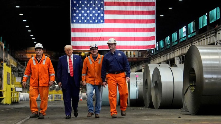 President Donald Trump walks with workers as he tours U.S. Steel Corporation's Mon Valley Works-Irvin plant, Friday, May 30, 2025, in West Mifflin, Pennsylvania.