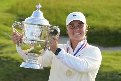 Maja Stark, of Sweden, holds her winning trophy after winning the U.S. Women's Open golf tournament at Erin Hills Sunday, June 1, 2025, in Erin, Wis. (AP Photo/Matt York)