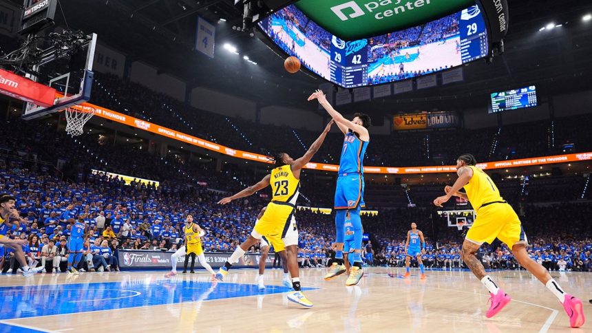 Oklahoma City Thunder forward Chet Holmgren (7) shoots against Indiana Pacers forward Aaron Nesmith (23) during the first half