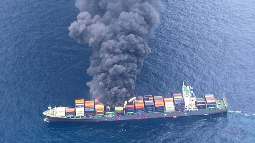 Smoke rises following an explosion and fire onboard a Singapore-flagged container ship off the coast of Kerala, India, June 9, 2025.