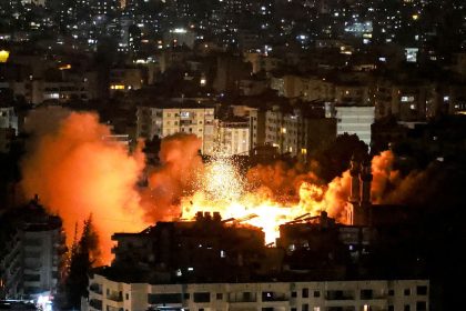 Smoke and fire erupt from the site of an Israeli airstrike on Beirut's southern suburbs on June 5.