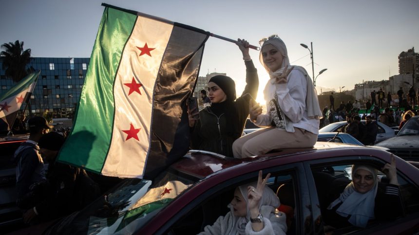 Women in Damascus, Syria, celebrate the fall of the Assad regime in December 2024.