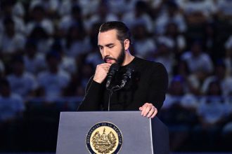 El Salvador's Nayib Bukele delivers a speech to high school students at the Adolfo Pineda National Gymnasium in San Salvador on March 15.