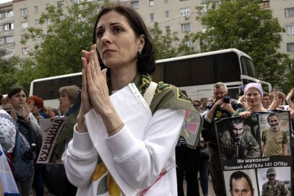 During a prisoner swap in May, Ukrainians in Chernihiv wait to see if their loved ones will be among the arrivals.