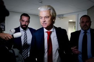 Geert Wilders speak with reporters in The Hague on June 3 as he withdraws his party from the Netherlands' governing coalition.