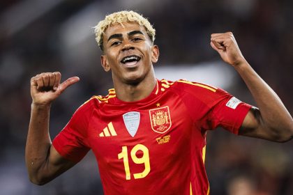 Lamine Yamal celebrates scoring during Spain's 5-4 win against France.