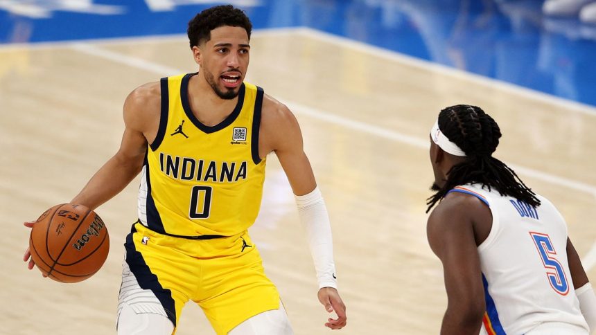 Tyrese Haliburton #0 of the Indiana Pacers is defended by Luguentz Dort #5 of the Oklahoma City Thunder during the second quarter in Game One of the 2025 NBA Finals.