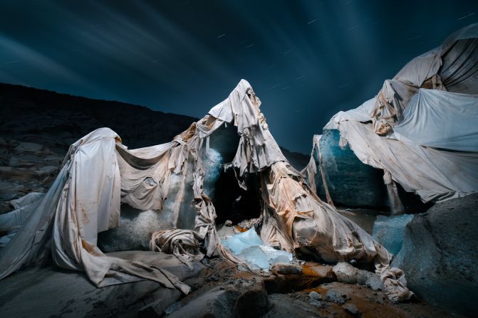 Liam Man’s series “Carcass of the Ice Beast” won the Earth Photo 2025 Climate of Change Award. In 2009, thermally reflective blankets were placed over the Rhône Glacier in Switzerland, to slow its melt, but today these coverings hang in tatters. Man said that it is a “tribute to human effort and a sobering reminder of its limits. Despite the dedication of a few, their interventions could not halt the glacier’s retreat.” Look through the gallery to see more of the Earth Photo winners.